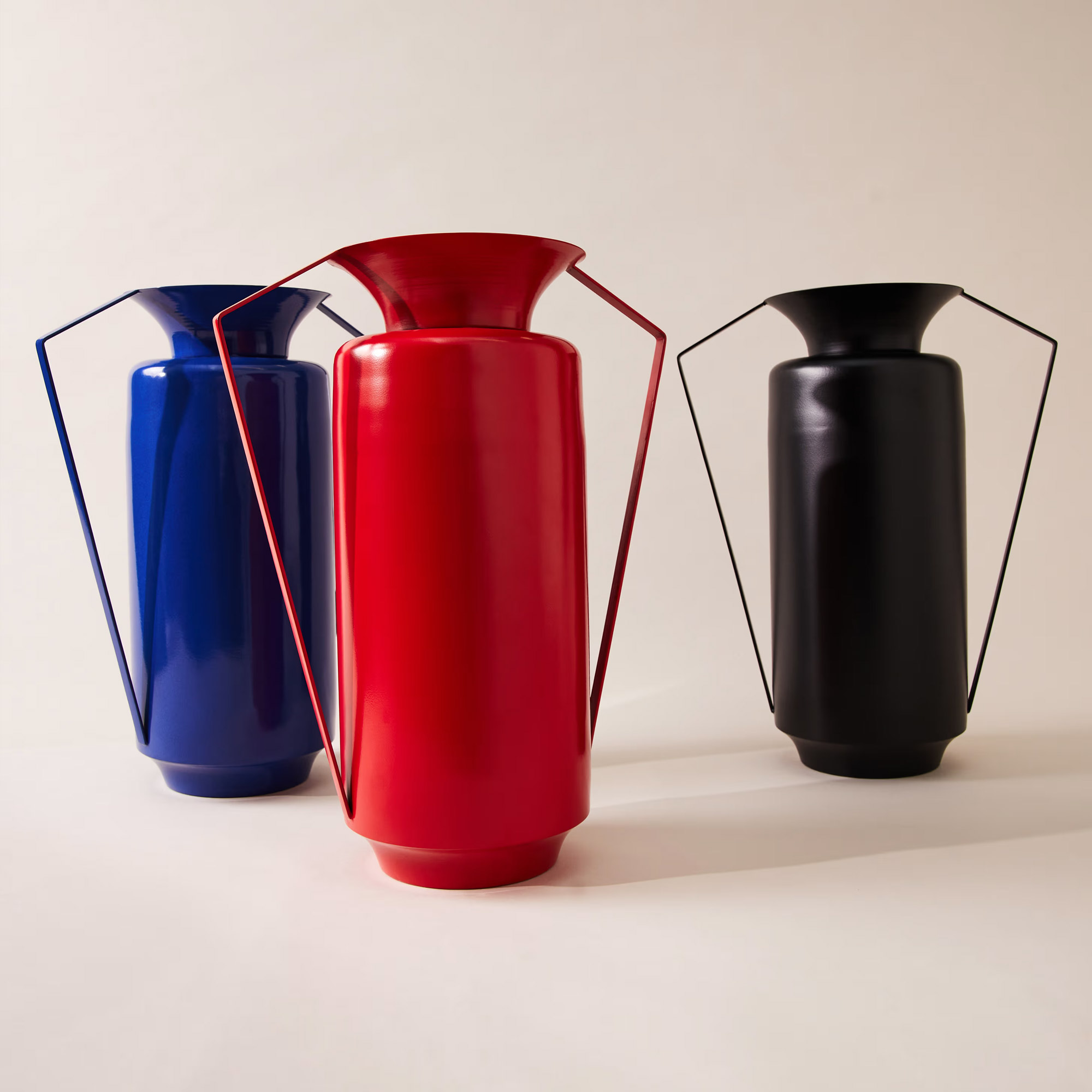 A group of colourful metallic amphora vases