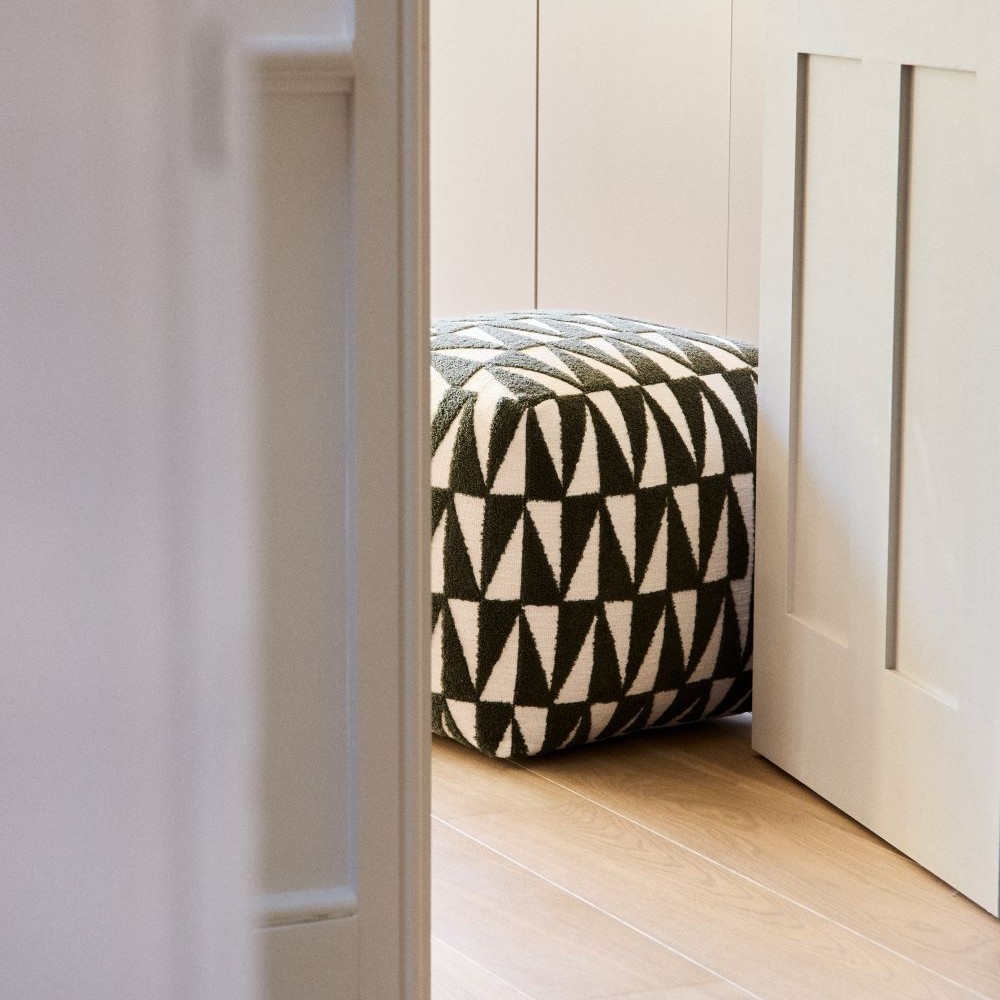 A green geometric footstool