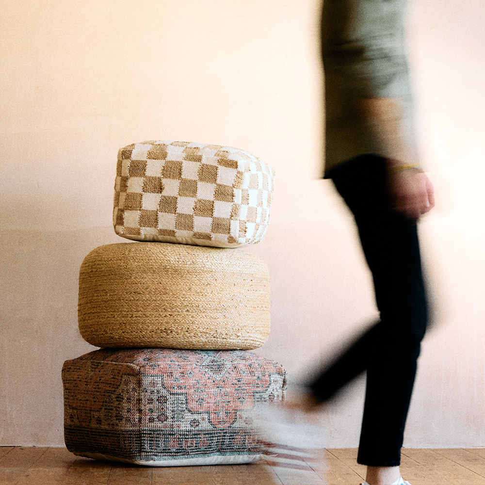 A pile of footstools in a living-room interior