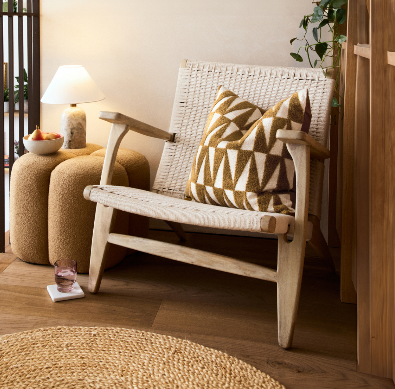 A woman wearing a green floral dress.