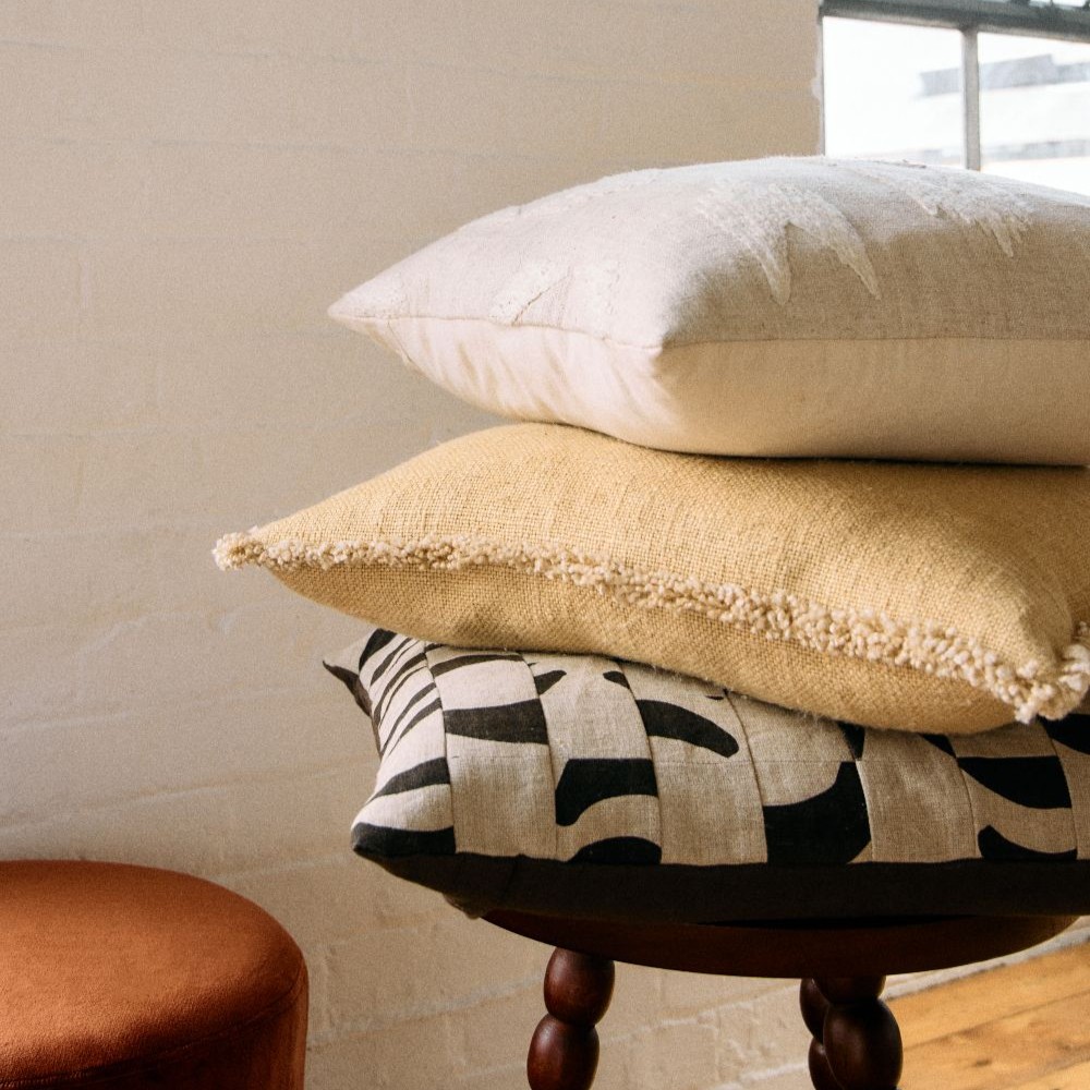 Three Cushions on a side table