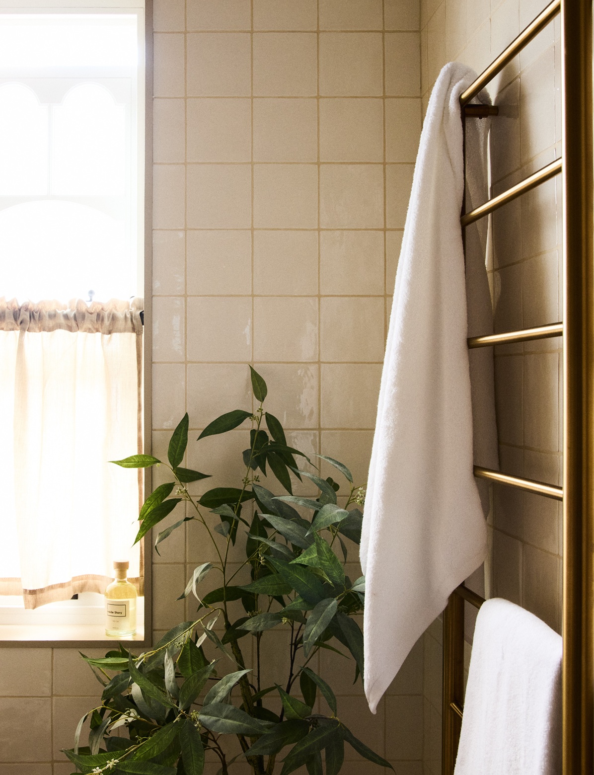 Cotton towel hung up in a bathroom