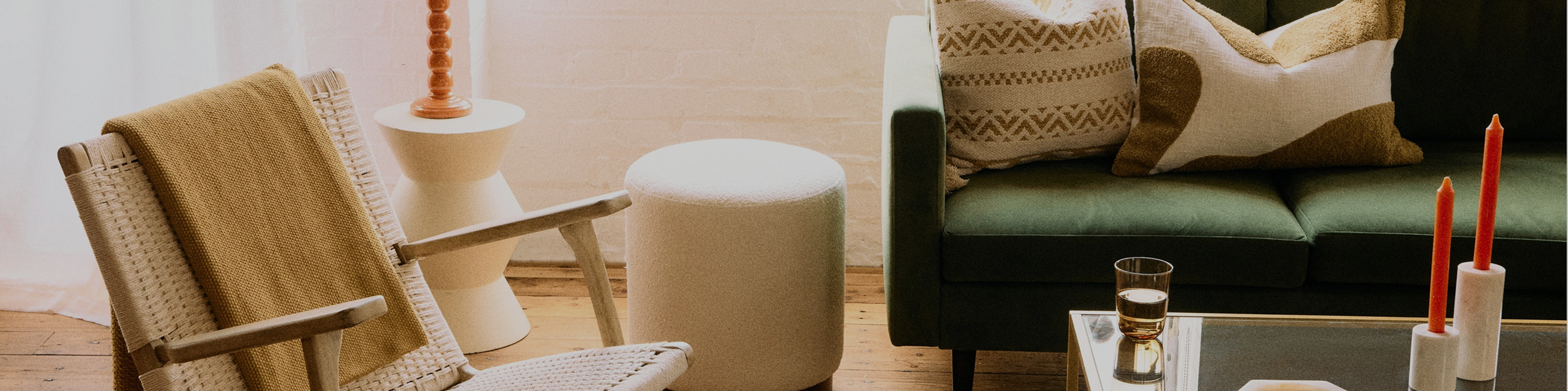 Armchair, sofa, lamp and rug in a living room